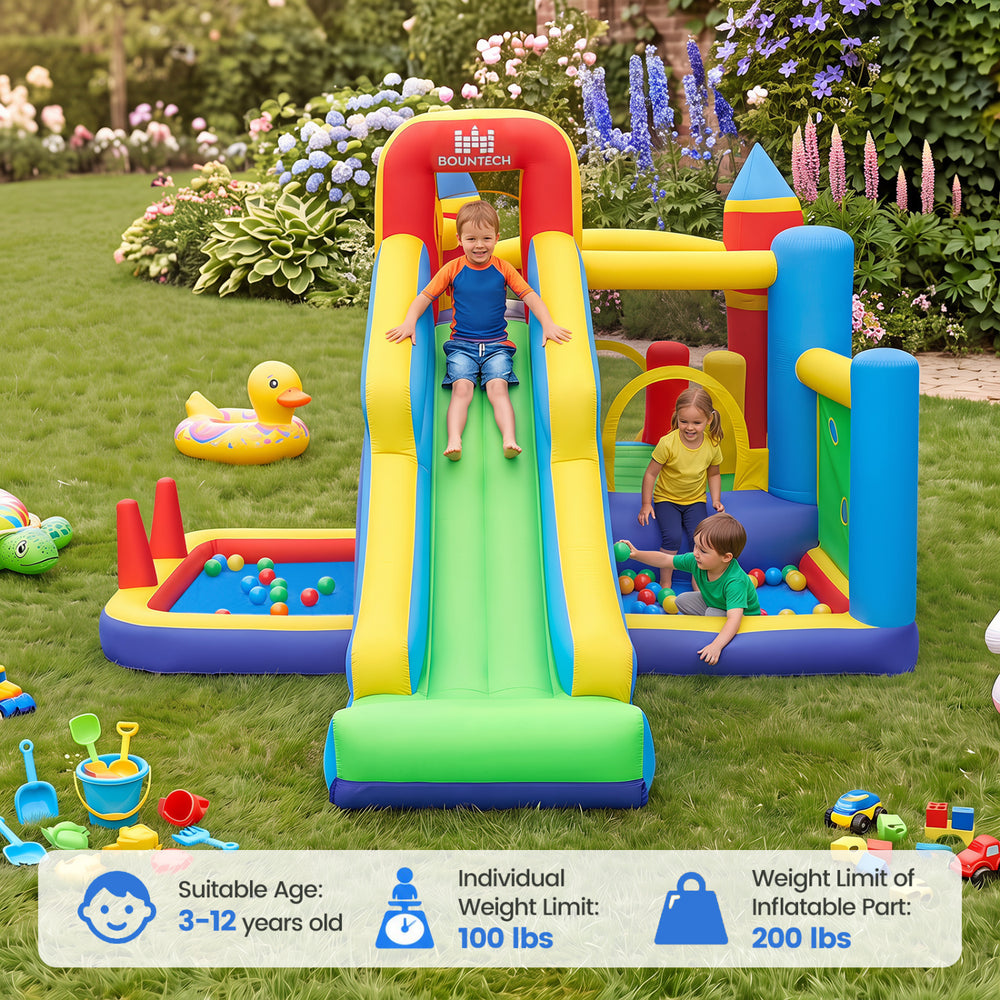 Colorful inflatable bounce house with slide, ball pit, climbing wall, and multiple activities for kids aged 3-12.