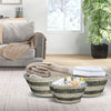 Stackable set of 3 natural canes grass baskets with hollowed handles, perfect for organized storage in any room.
