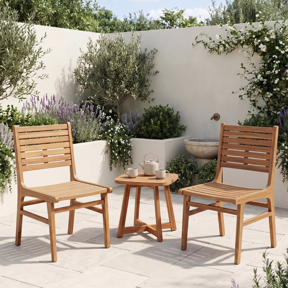 Natural wood armless patio chairs with slanted backs and slatted seats, perfect for outdoor relaxation on the deck or.