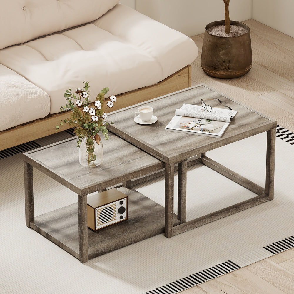 Nesting coffee table set of 2 in gray with spacious tabletop and bottom shelf, perfect for living room organization.