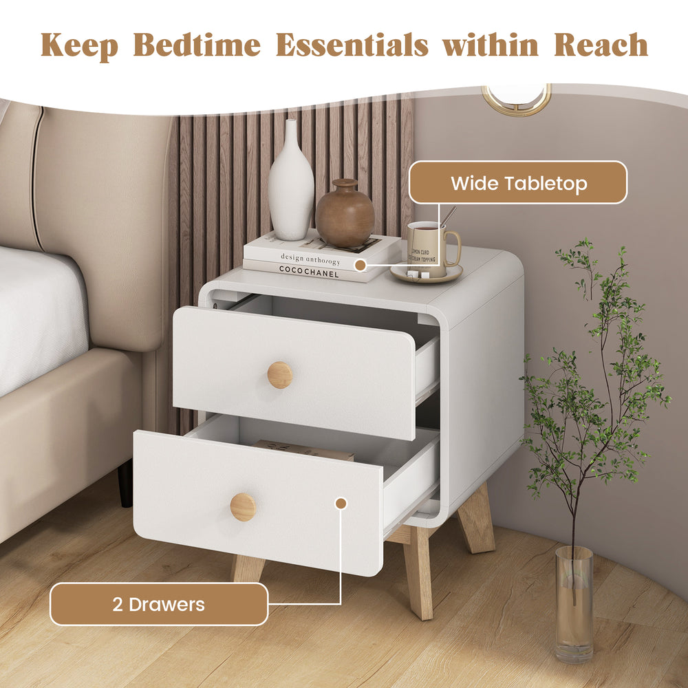 White nightstand with 2 drawers and solid rubber wood legs, featuring a wide tabletop for bedtime essentials.