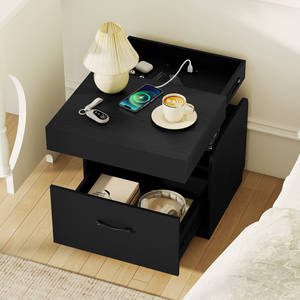 Black nightstand with charging station, sliding top storage, and pull-out drawer for organized bedside essentials.
