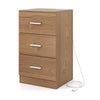 Natural wood nightstand featuring a side view of three spacious drawers and built-in charging station for easy access.
