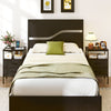 Modern black nightstand with charging station, two fabric drawers, and a stylish wood-like surface for versatile use.