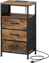 Nightstand with charging station features 3 fabric drawers and a rustic brown wood-like surface for versatile storage.