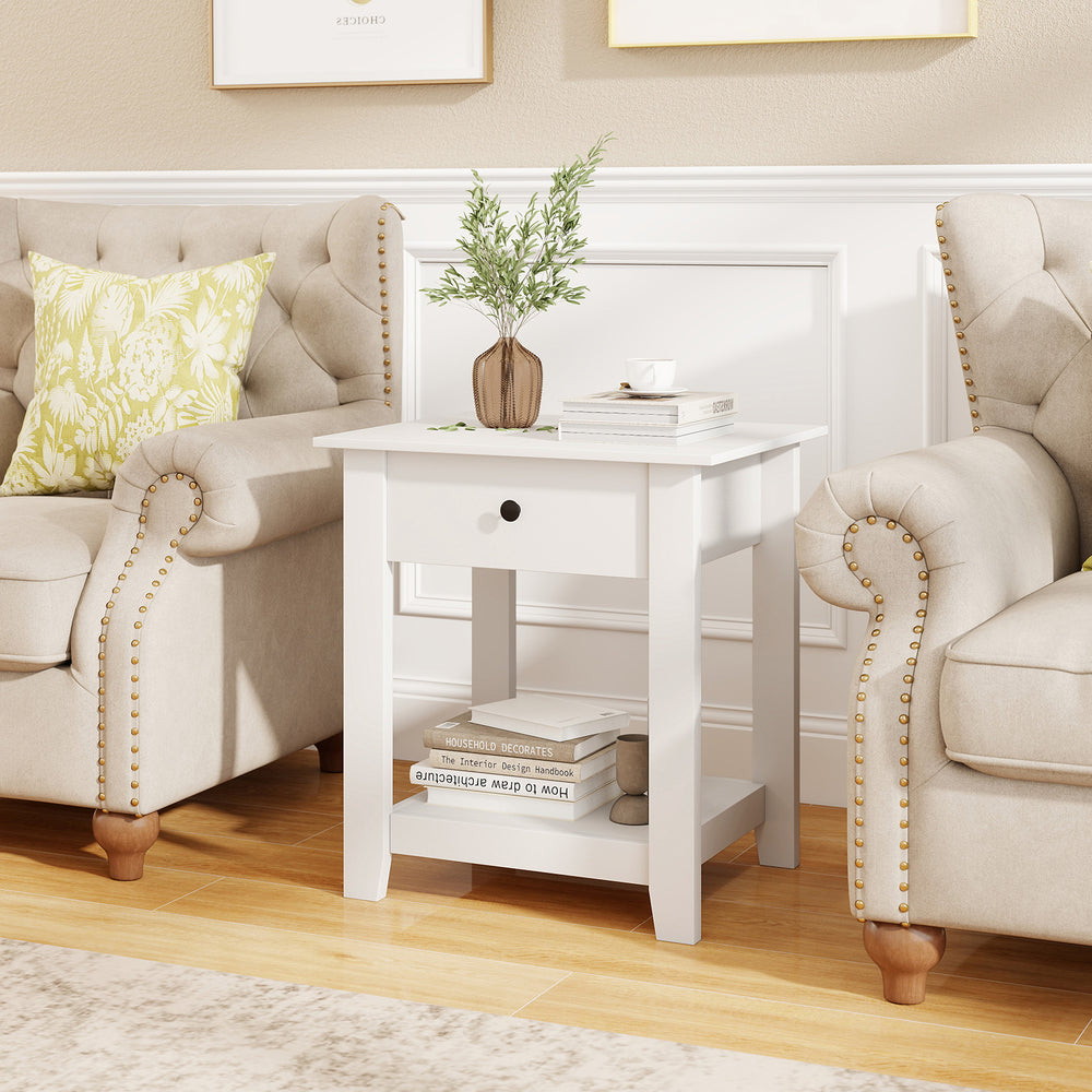 White nightstand with drawer and open shelf, featuring a spacious top for lamps and decor, perfect for bedroom or.