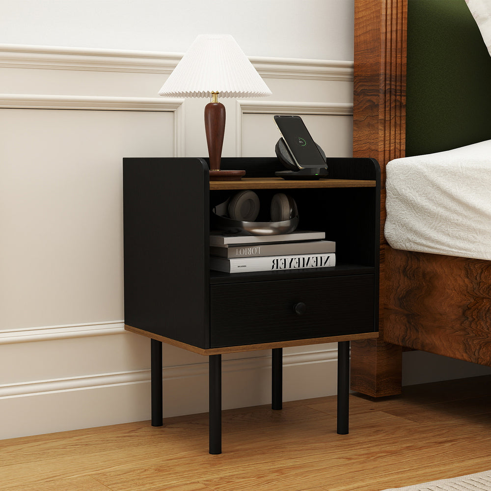 Black nightstand with drawer and open shelf, featuring metal legs, ideal for storage beside a sofa or bed.