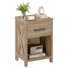 Natural nightstand featuring a spacious drawer and open shelf, designed with X-shaped patterns for farmhouse style.
