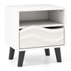 Nightstand with 3D wavy pattern and open shelf, showcasing tapered legs for a stylish mid-century modern touch.