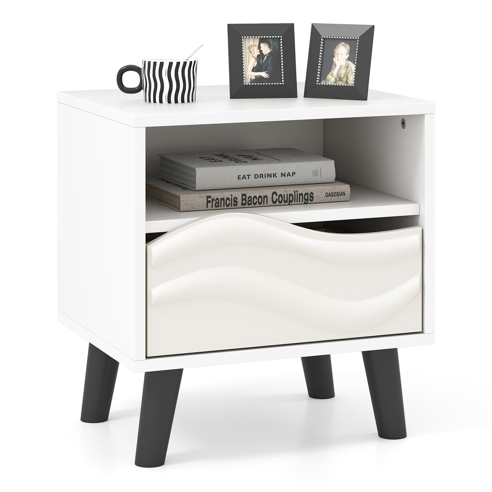 Mid-century modern nightstand in white with a 3D wavy pattern, featuring an open shelf and spacious drawer for storage.