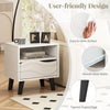 Mid-century modern nightstand with a 3D wavy pattern, open shelf, and tapered support feet for stylish storage.
