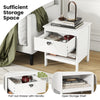 White 2-tier wood nightstand featuring a pull-out drawer and open storage shelf, ideal for bedroom organization.
