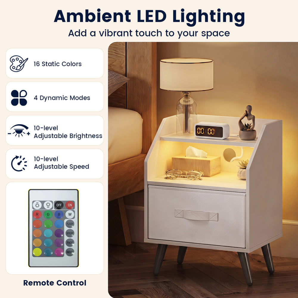 Nightstand with LED lights features a fabric drawer, open storage shelf, and built-in charging station for convenience.