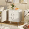 Stylish nightstand in white showcases a wide tabletop and spacious drawers, perfect for bedside organization and decor.
