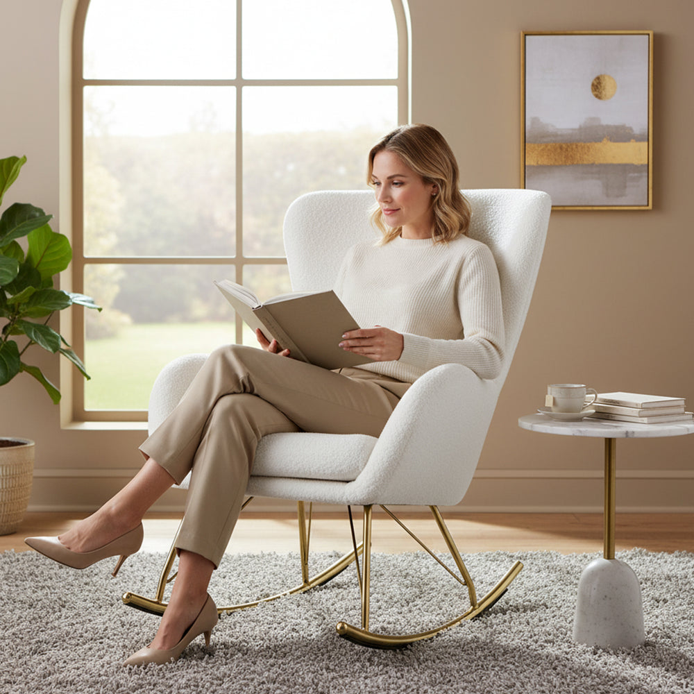 Nursery rocking chair with curved backrest and armrests in white, featuring teddy fleece cover and ergonomic support.