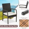 Patio wicker dining chair with ergonomic backrest, soft zippered cushion, and sturdy X-shaped metal frame for outdoor.