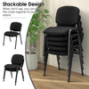 Black office chair with padded cushions, metal frame, stackable design for space-saving in conference or waiting rooms.