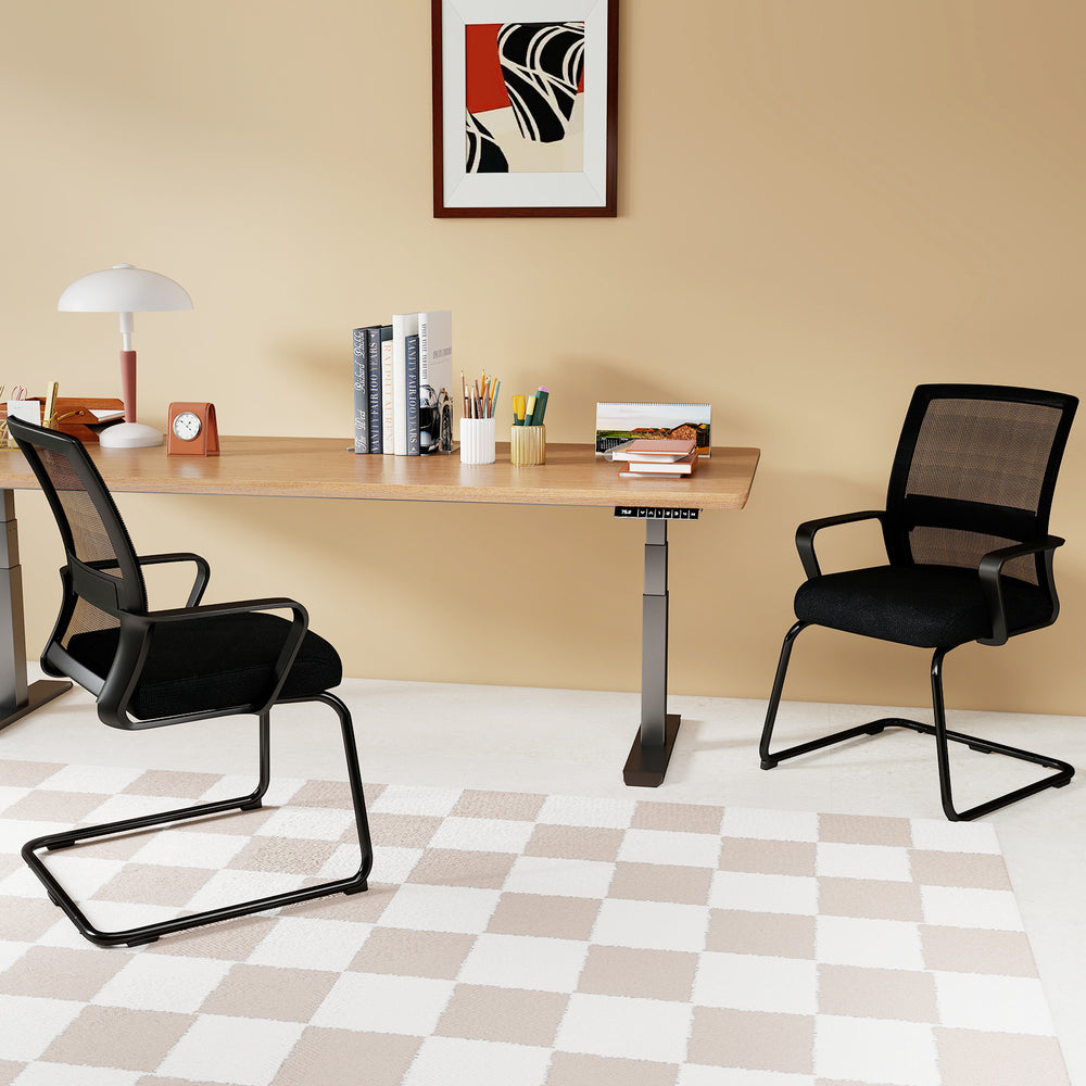 Office guest chairs with breathable mesh backs and lumbar support, ideal for home office or waiting room settings.