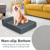 Orthopedic dog bed with headrest in grey, featuring a non-slip bottom, ideal for large dogs' comfort and support.