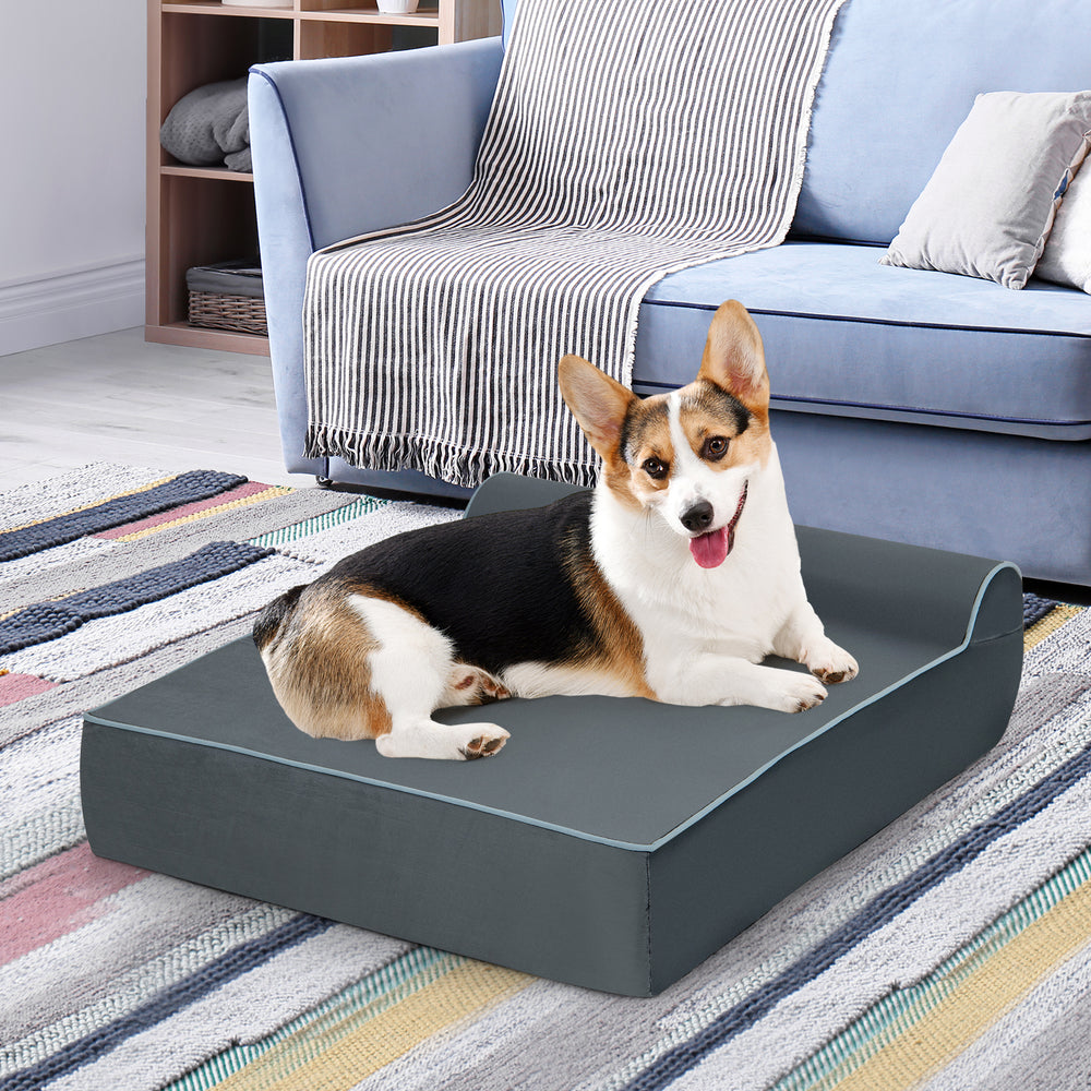 Grey orthopedic dog bed with headrest, showcasing a soft fabric finish and supportive foam for large dogs' comfort.