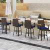 Outdoor 360° swivel bar stool with navy cushion and acacia wood armrests, perfect for poolside or backyard gatherings.