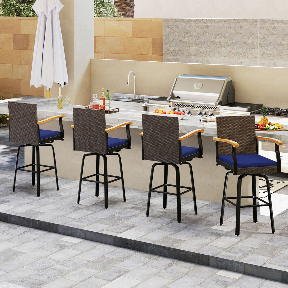 Outdoor 360° swivel bar stool with navy cushion and acacia wood armrests, perfect for poolside or backyard gatherings.