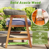 Outdoor acacia wood dining chair with gray cushion, featuring reinforced crossbars for stability and natural elegance.