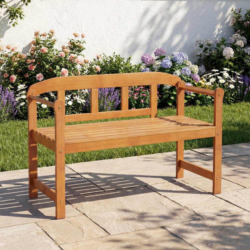 Acacia wood garden bench with angled armrests, 2-seater design, perfect for outdoor patio or porch relaxation.