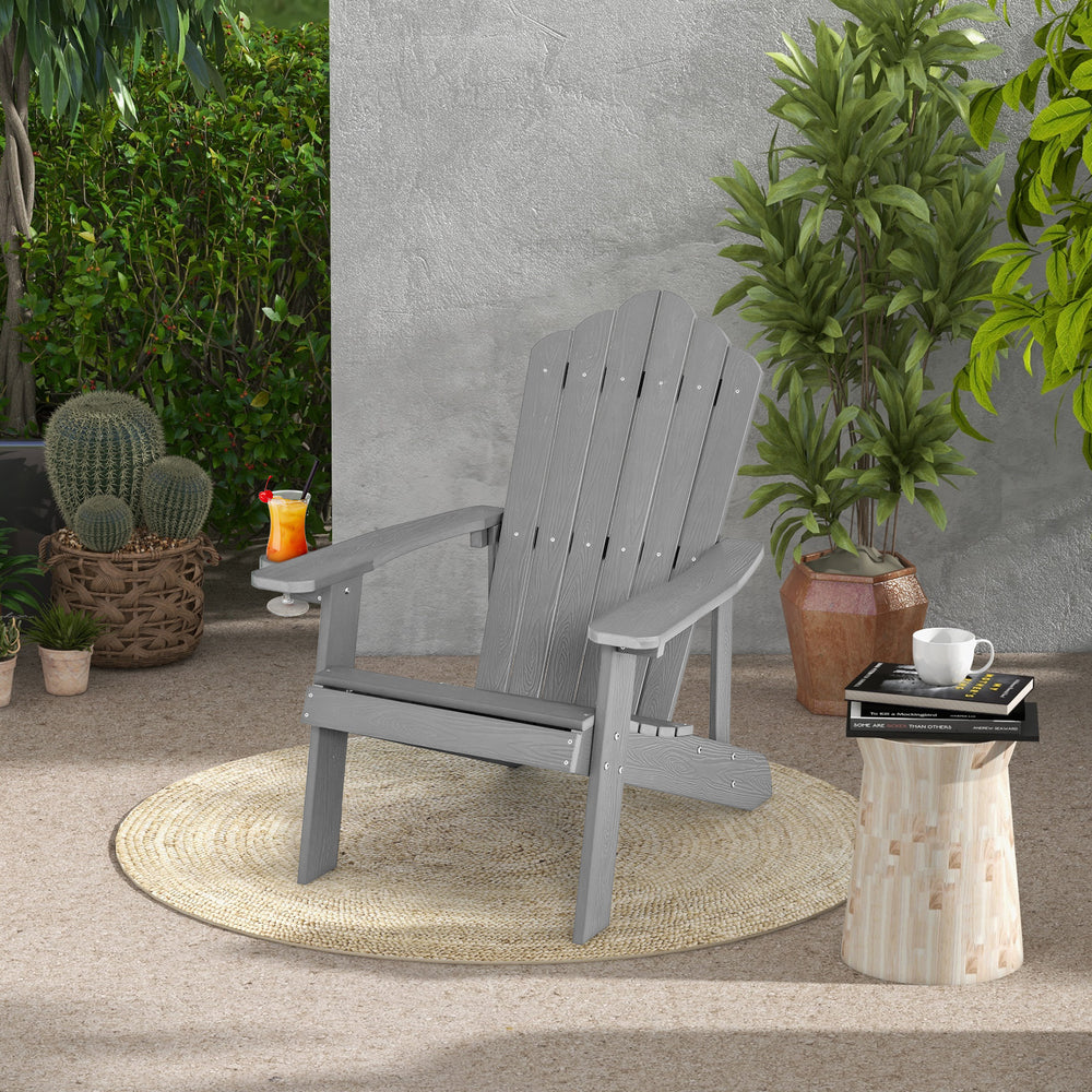 Gray HIPS outdoor Adirondack chair showcasing elegant fan-shape backrest and hidden cup holder, ideal for garden use.