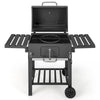 Outdoor BBQ charcoal grill with foldable side tables, wheels, and a built-in temperature gauge for easy grilling.