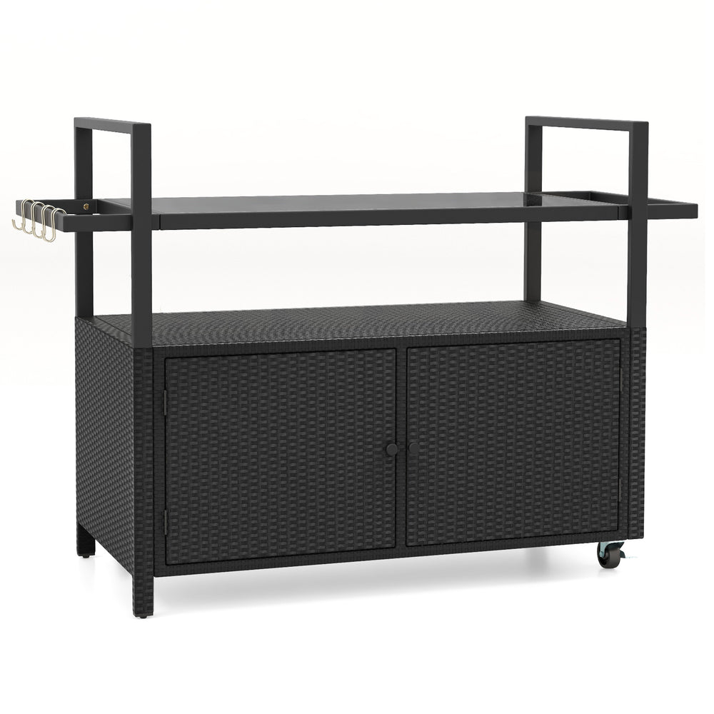 Outdoor bar cart in black with tempered glass top, PE rattan storage, and 8 hooks, perfect for buffets and BBQ parties.