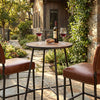 Round 41-inch outdoor bar table with acacia wood top and metal frame, perfect for patio gatherings with two to three.