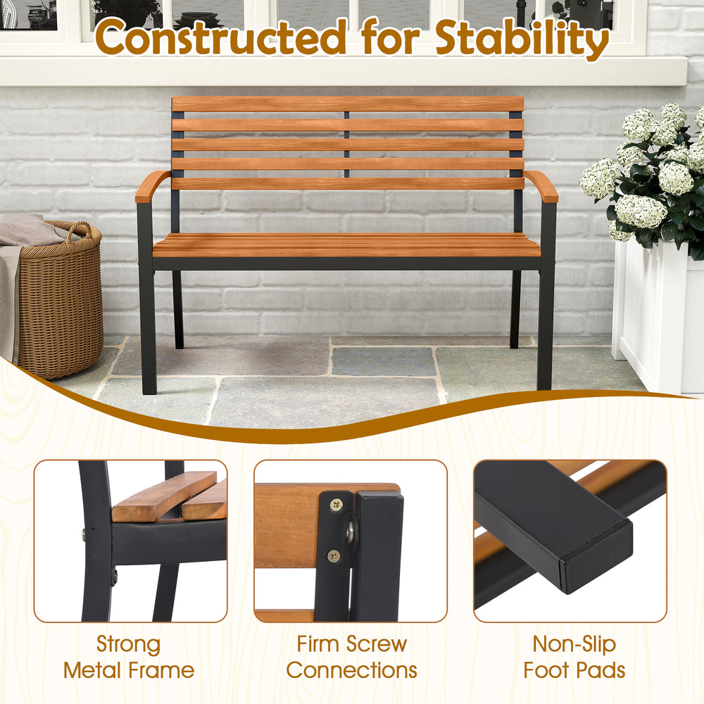Outdoor acacia wood patio loveseat with backrest and armrests, featuring a strong metal frame and non-slip foot pads.