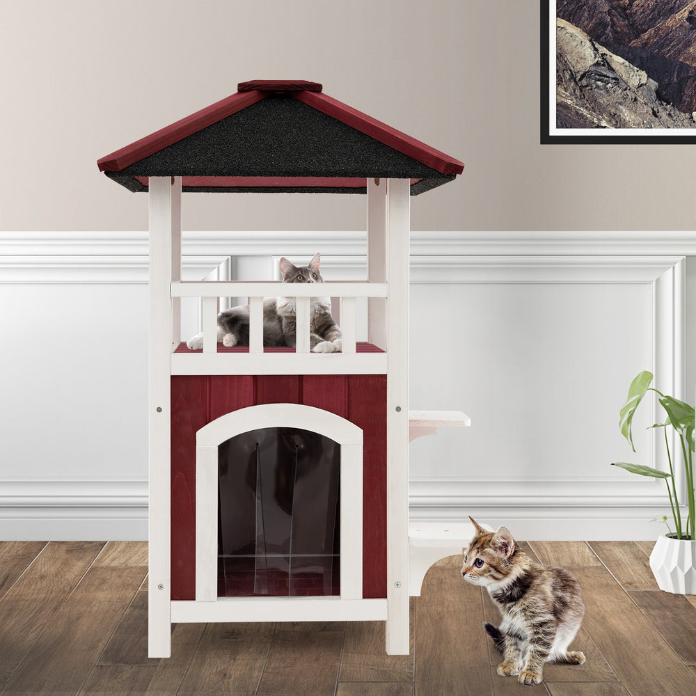 2-story wooden cat house in red and white with balcony, asphalt roof, and rain curtain for indoor and outdoor use.