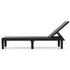 Black outdoor chaise lounger chair with adjustable backrest and waterproof rattan textured PP surface for sunbathing.