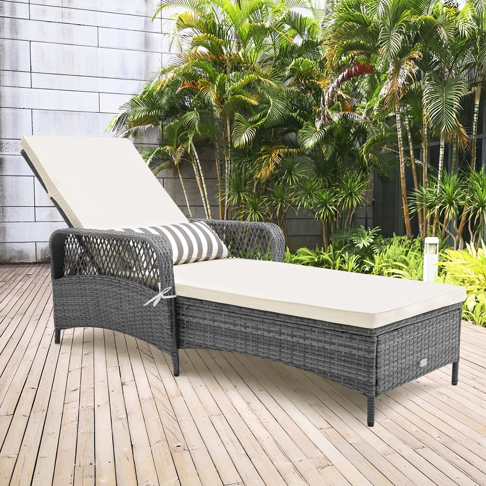 Outdoor chaise lounge chair recliner in gray PE rattan with adjustable backrest, perfect for poolside relaxation.