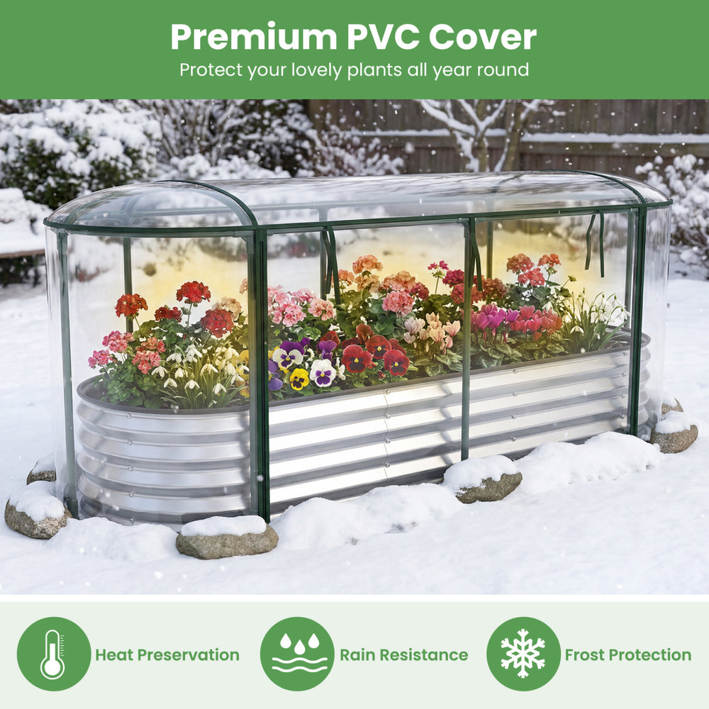 Outdoor raised garden bed with clear PVC greenhouse cover, providing frost protection and heat preservation for plants.