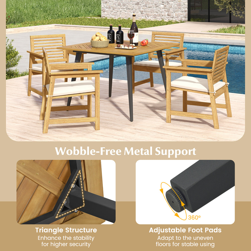 Acacia wood outdoor dining table for 4 with wobble-free metal support and adjustable foot pads, perfect for backyard.