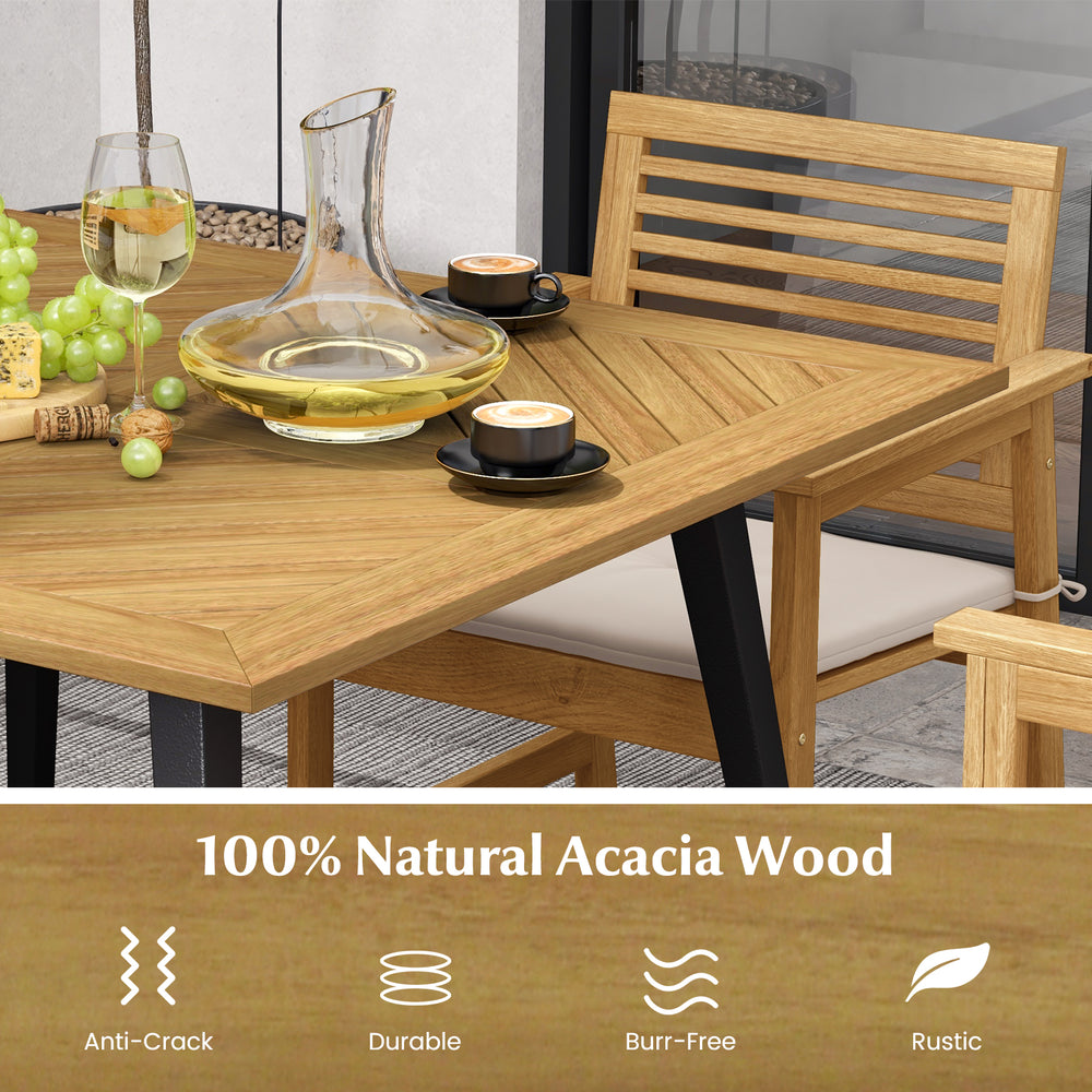 Acacia wood outdoor dining table with ample surface, designed for 4 people, featuring a rustic finish and umbrella hole.