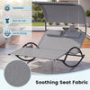 Outdoor dual rocker sunbed with gray soothing seat fabric, large canopy, and detachable headrests for backyard.