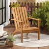 Natural acacia wood Adirondack lounge armchair with wide armrests, perfect for backyard or garden relaxation.