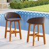 Set of 2 outdoor faux rattan bar chairs with acacia wood legs, ergonomic backrests, and footrests by the poolside.
