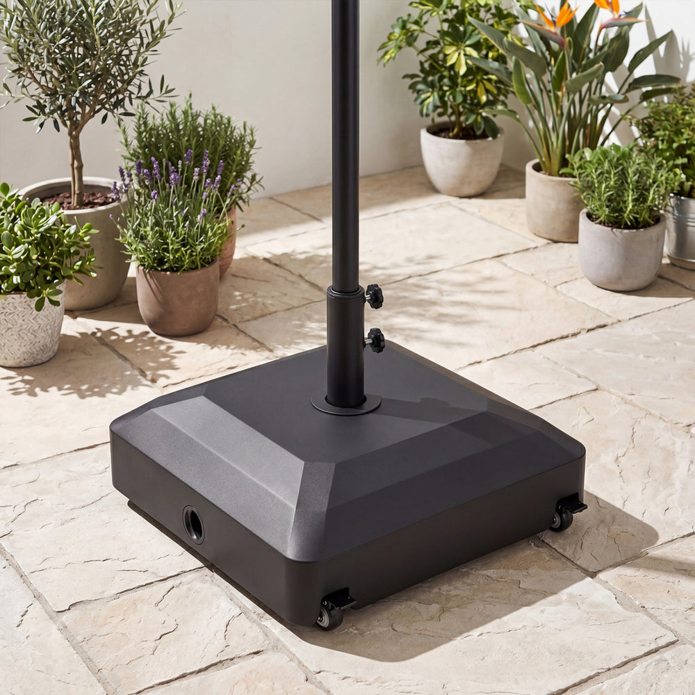 Close-up of the outdoor umbrella base showcasing the durable PP material, water fillable feature, and adjustable knobs.