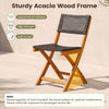 Folding outdoor chair made of sturdy acacia wood and breathable PE rattan, perfect for patio or balcony use.