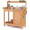 Outdoor garden wooden potting bench with solid wood construction, waterproof design, and large metal tabletop for gardening tasks.