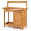 Outdoor garden wooden work station potting bench with a large metal tabletop, big drawer, and removable lower shelf.