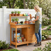 Outdoor garden wooden potting bench with solid wood construction, large metal tabletop, and ample storage for gardening tasks.