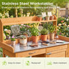 Outdoor garden wooden potting bench with a stainless steel tabletop, featuring ample storage for gardening tasks.