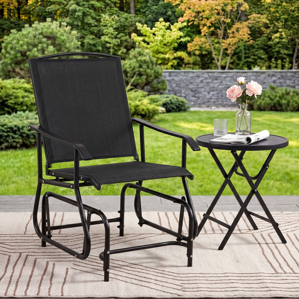 Tangkula outdoor glider chair with comfortable contoured seat and anti-slip foot pads, ideal for backyard lounging.