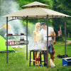 Couple grilling under the 8 x 5 feet outdoor gazebo with beige canopy, showcasing its spacious design and side shelves.
